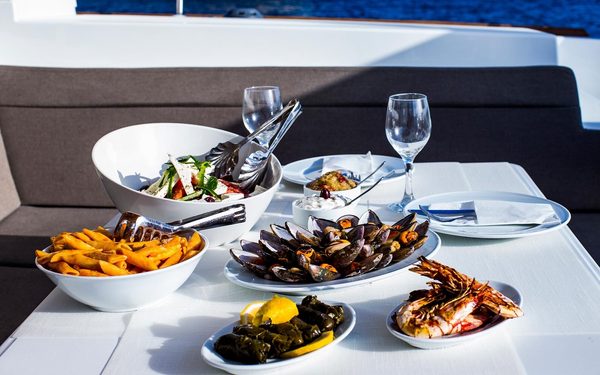 Lunch on deck: Greek salad, mussels, grilled prawns, stuffed vine leaves and pasta