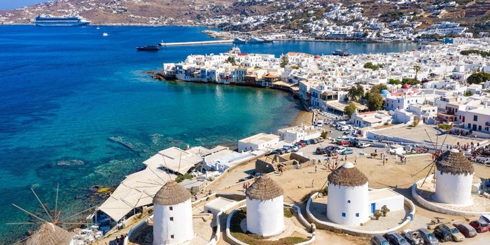 Mykonos windmills above Little Venice and the old harbour, seen from the air